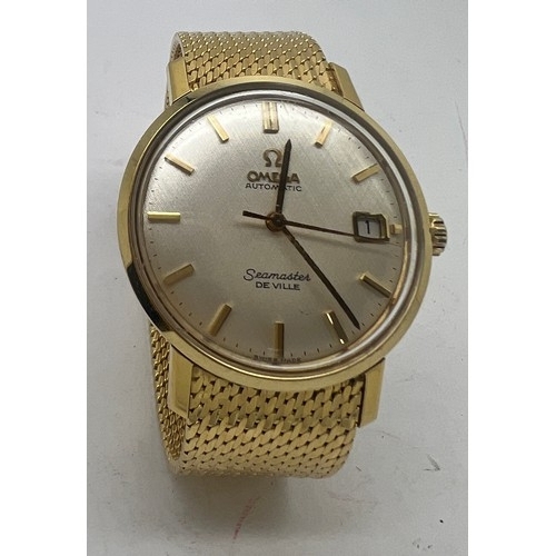 713 - An 18 carat gold gentleman’s Omega De Ville Seamaster wristwatch on 18ct gold bracelet with date ape... 