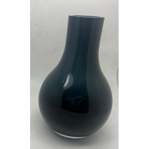 426 - A Georg Jensen blue glass ‘Cafu’ vase. 15cm h.