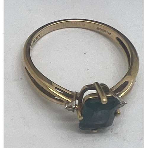 665 - A nine carat gold gem set ring, size R. Weight 2.2gm.