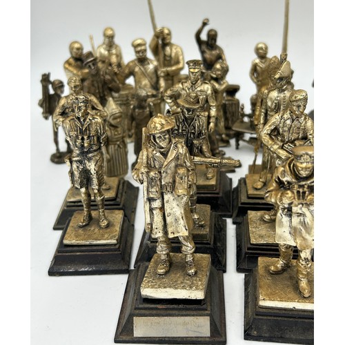 1300 - A collection of 29 Royal Hampshire Pewter military figures together with 14 other figures depicting ... 