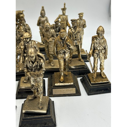 1300 - A collection of 29 Royal Hampshire Pewter military figures together with 14 other figures depicting ... 