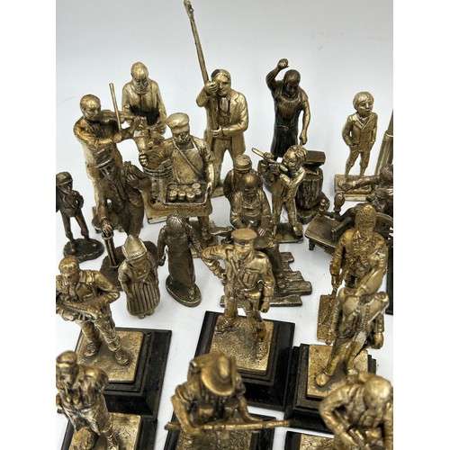 1300 - A collection of 29 Royal Hampshire Pewter military figures together with 14 other figures depicting ... 