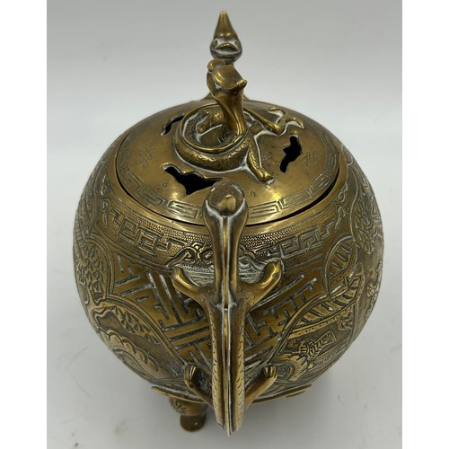 968 - Chinese brass censer, spherical form with pierced lid, dragon handles and engraved sides, 20cm h tog... 