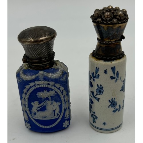 185 - Two blue and white perfume bottles with metal tops, one Delft 8cm h.