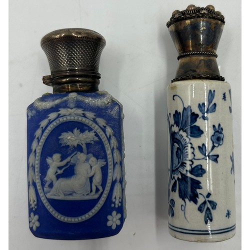 185 - Two blue and white perfume bottles with metal tops, one Delft 8cm h.