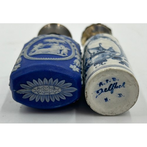 185 - Two blue and white perfume bottles with metal tops, one Delft 8cm h.