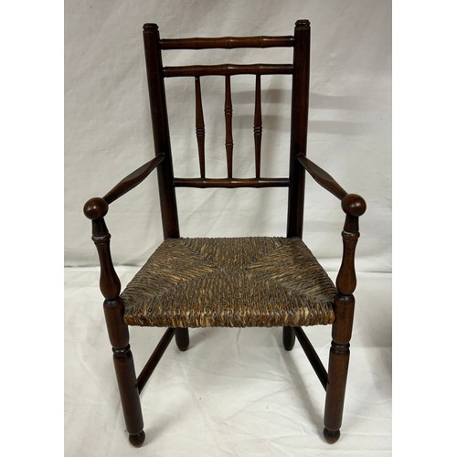 1302 - Two small chairs - A doll's spindle back carver chair with rush work seat 34cm h x 19cm h together w... 