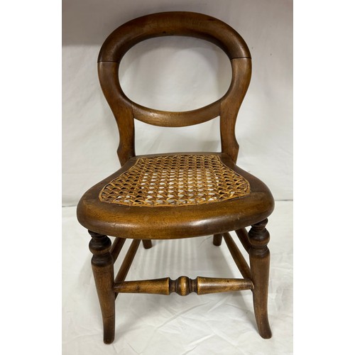 1302 - Two small chairs - A doll's spindle back carver chair with rush work seat 34cm h x 19cm h together w... 