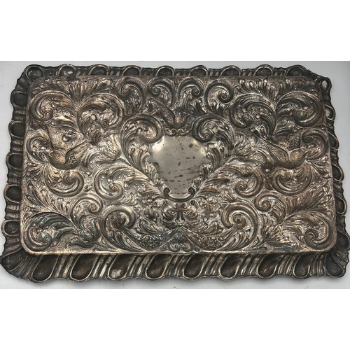 796 - A embossed silver tray Weight 357gm. 30cm x 20cm. Chester 1900. Maker William Neale.