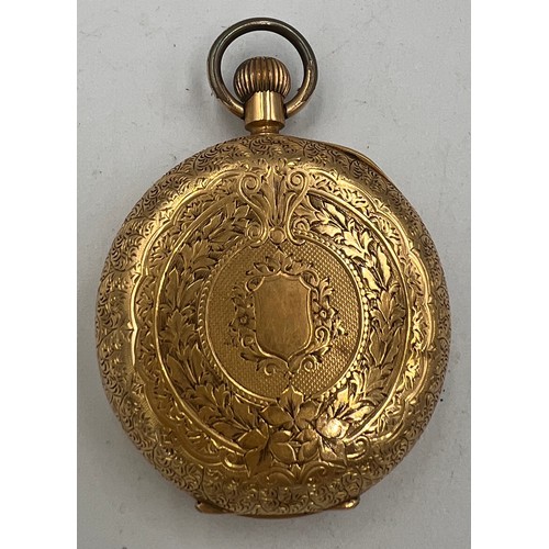 704 - An 18 carat gold cased pocket watch. 4cm d. Total weight 53gm.