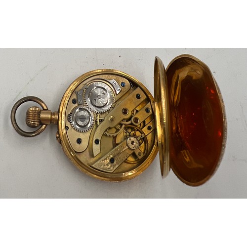 704 - An 18 carat gold cased pocket watch. 4cm d. Total weight 53gm.