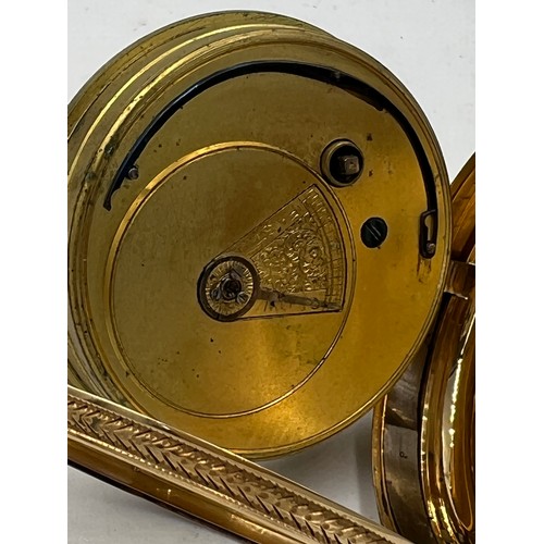 705 - An 18 carat gold cased pocket watch with subsidiary seconds dial. 5.5cm d. Total weight 156gm.