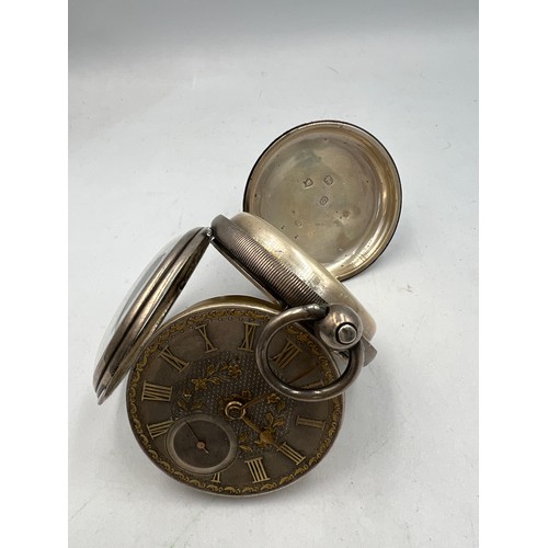 706 - A silver fusée pocket watch with subsidiary seconds dial and silver chain and associated key.  Londo... 