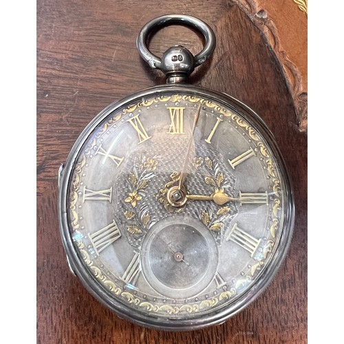 706 - A silver fusée pocket watch with subsidiary seconds dial and silver chain and associated key.  Londo... 