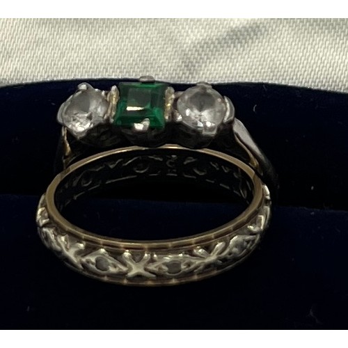 611 - Two rings, one 9 carat gold and silver set with green and clear stones, size M, the other 9 carat go... 