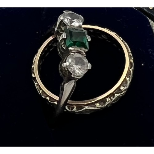 611 - Two rings, one 9 carat gold and silver set with green and clear stones, size M, the other 9 carat go... 