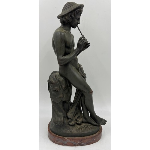 1304 - Jacques Antoine Theodore Coinchon, French, bronze figure of pan seated on a tree stump on a red marb... 