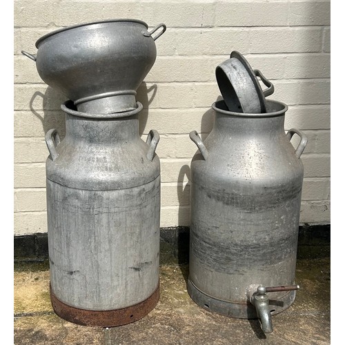 32 - Two twin handled galvanised Danish milk churns to include a Trifolet Tilhorer made in Viborg dated 1... 