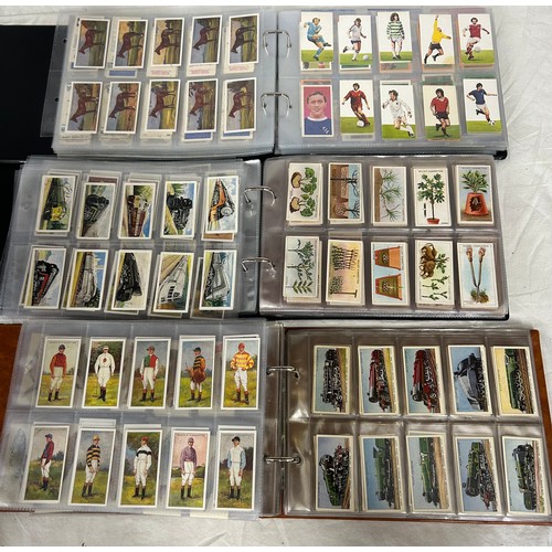 405 - A large collection of Cigarette Cards and Tea cards in excess of 9,000 to include 5 x albums with co... 