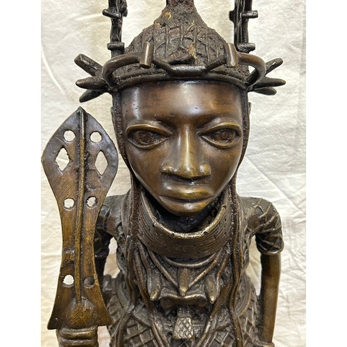 923 - A heavy cast bronze figure of a King of the Ancient African Kingdom of Benin, now modern day Souther... 