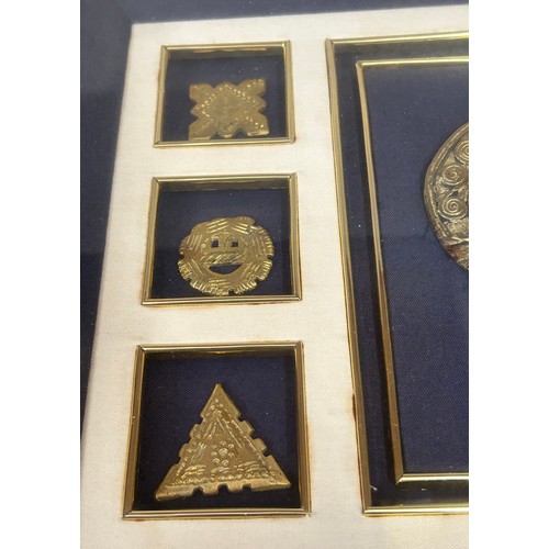 926 - Two framed cases containing Nigerian fasteners and comb together with three Nigerian books ' An Intr... 