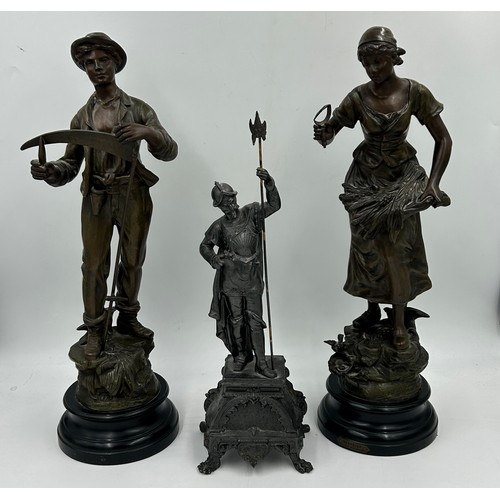 1310 - Three late 19thC Spelter figurines to include Man with sickle 50cm h, Woman with sickle 'Surprise' 5... 