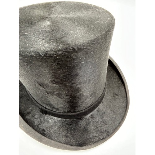 856 - A collection of eight Silk/Beaver Top Hats to include Scott & Co 21cm x 16.5 cm in leather case by C... 