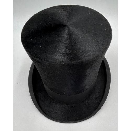 856 - A collection of eight Silk/Beaver Top Hats to include Scott & Co 21cm x 16.5 cm in leather case by C... 