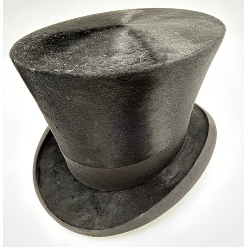 856 - A collection of eight Silk/Beaver Top Hats to include Scott & Co 21cm x 16.5 cm in leather case by C... 