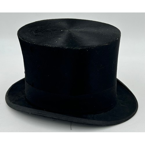 856 - A collection of eight Silk/Beaver Top Hats to include Scott & Co 21cm x 16.5 cm in leather case by C... 