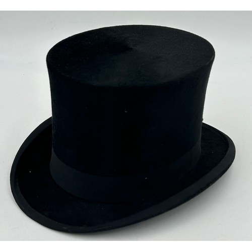 856 - A collection of eight Silk/Beaver Top Hats to include Scott & Co 21cm x 16.5 cm in leather case by C... 