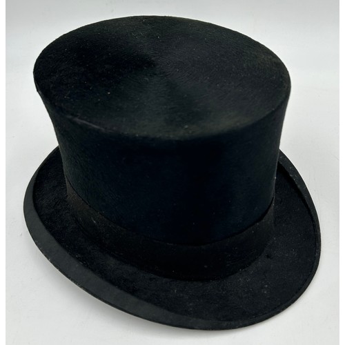 856 - A collection of eight Silk/Beaver Top Hats to include Scott & Co 21cm x 16.5 cm in leather case by C... 