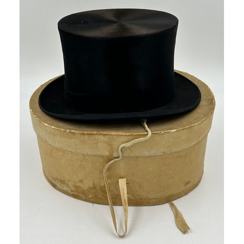 856 - A collection of eight Silk/Beaver Top Hats to include Scott & Co 21cm x 16.5 cm in leather case by C... 