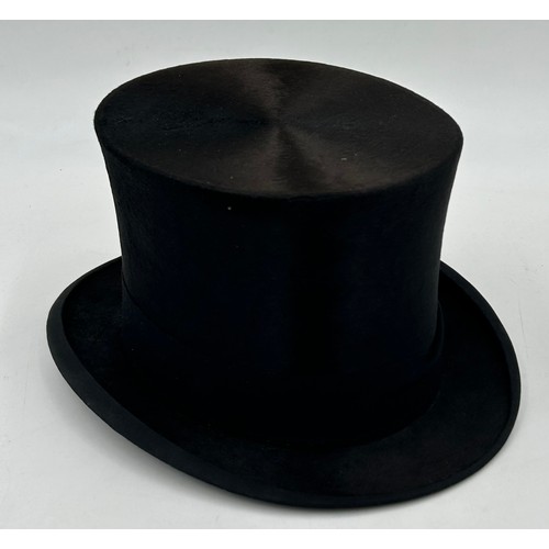 856 - A collection of eight Silk/Beaver Top Hats to include Scott & Co 21cm x 16.5 cm in leather case by C... 