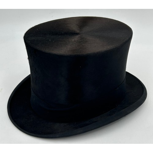 856 - A collection of eight Silk/Beaver Top Hats to include Scott & Co 21cm x 16.5 cm in leather case by C... 