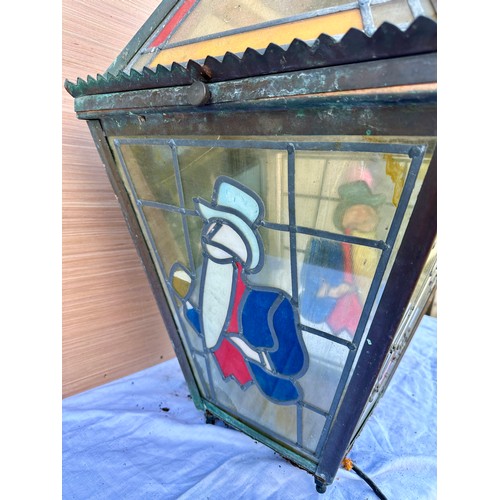 1010 - A stained glass William Younger pub wall light/lantern. 43cm x 43cm x 77cm h.