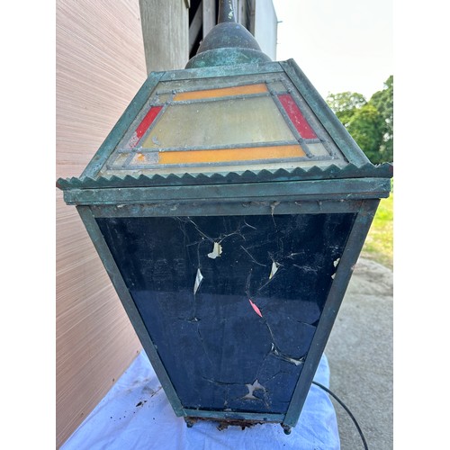 1010 - A stained glass William Younger pub wall light/lantern. 43cm x 43cm x 77cm h.