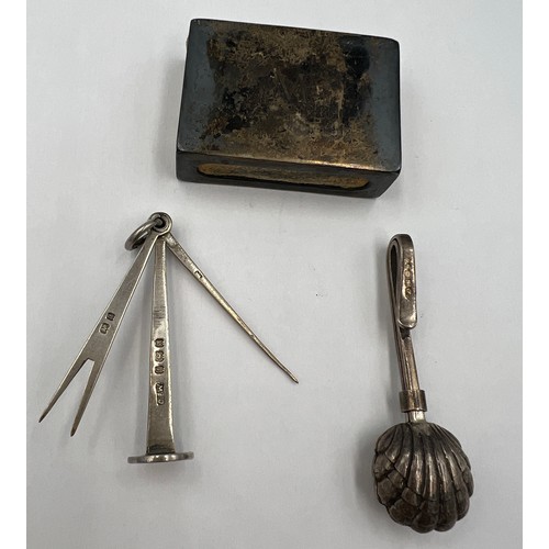 788 - Silver tobacco tamper Birmingham 1900, maker GE Walton & Co Ltd, silver napkin holder and a silver m... 