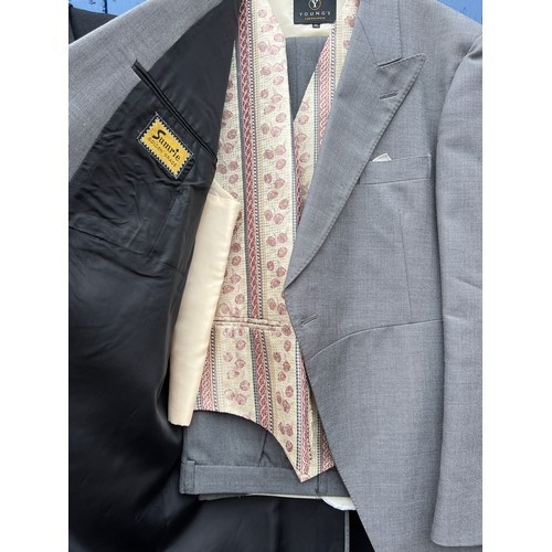 858 - Two vintage gentleman’s tail suits both with waistcoats and trousers together with a grey felt top h... 