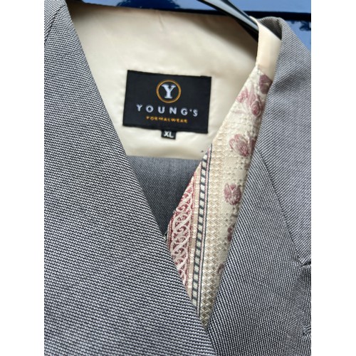 858 - Two vintage gentleman’s tail suits both with waistcoats and trousers together with a grey felt top h... 