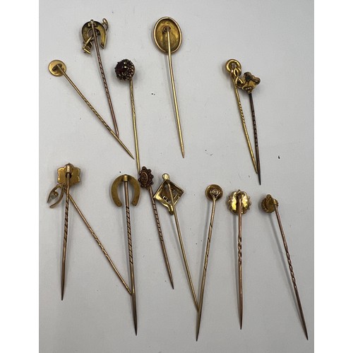 621 - Eight various 15 carat gold tie pins with six 9 carat gold tie pins set with seed pearls, diamond ch... 