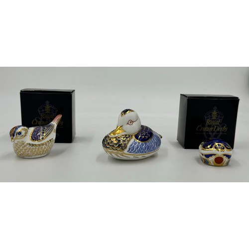 404 - Three Royal Crown Derby paperweights to include a goldcrest, Millennium bug with certificate and a d... 