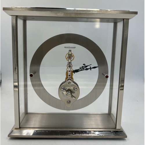 999 - A Jaeger-LeCoultre skeleton clock. 16cm h x 15cm w.