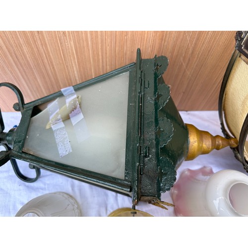 1014 - A quantity of vintage lighting to include glass shades, street lamp, ceiling drop light fitting 46cm... 