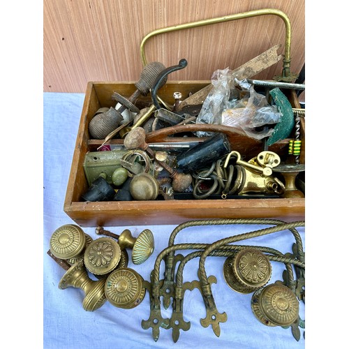 1319 - A large quantity of vintage brass and metal furniture and door fittings, locks etc.