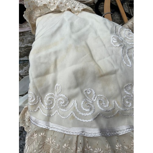 859 - A quantity of mainly Edwardian costume to include silk chemise, silk and lace jacket, christening ca... 