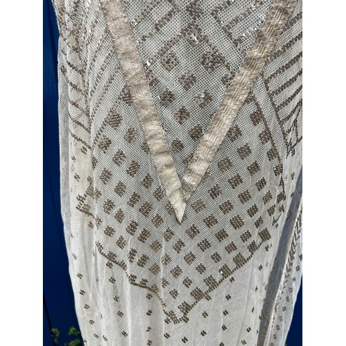 852 - A vintage cream net and metallic silver embroidered dress made with Egyptian azute shawl with long t... 