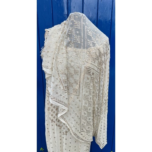 852 - A vintage cream net and metallic silver embroidered dress made with Egyptian azute shawl with long t... 