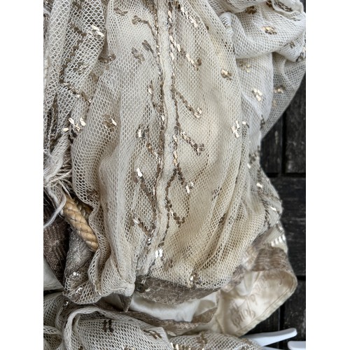 852 - A vintage cream net and metallic silver embroidered dress made with Egyptian azute shawl with long t... 