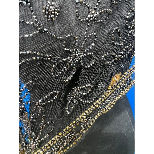 855 - 1920’s bead work fashion to include black and silver overdress, black beadwork top and skirt and a g... 